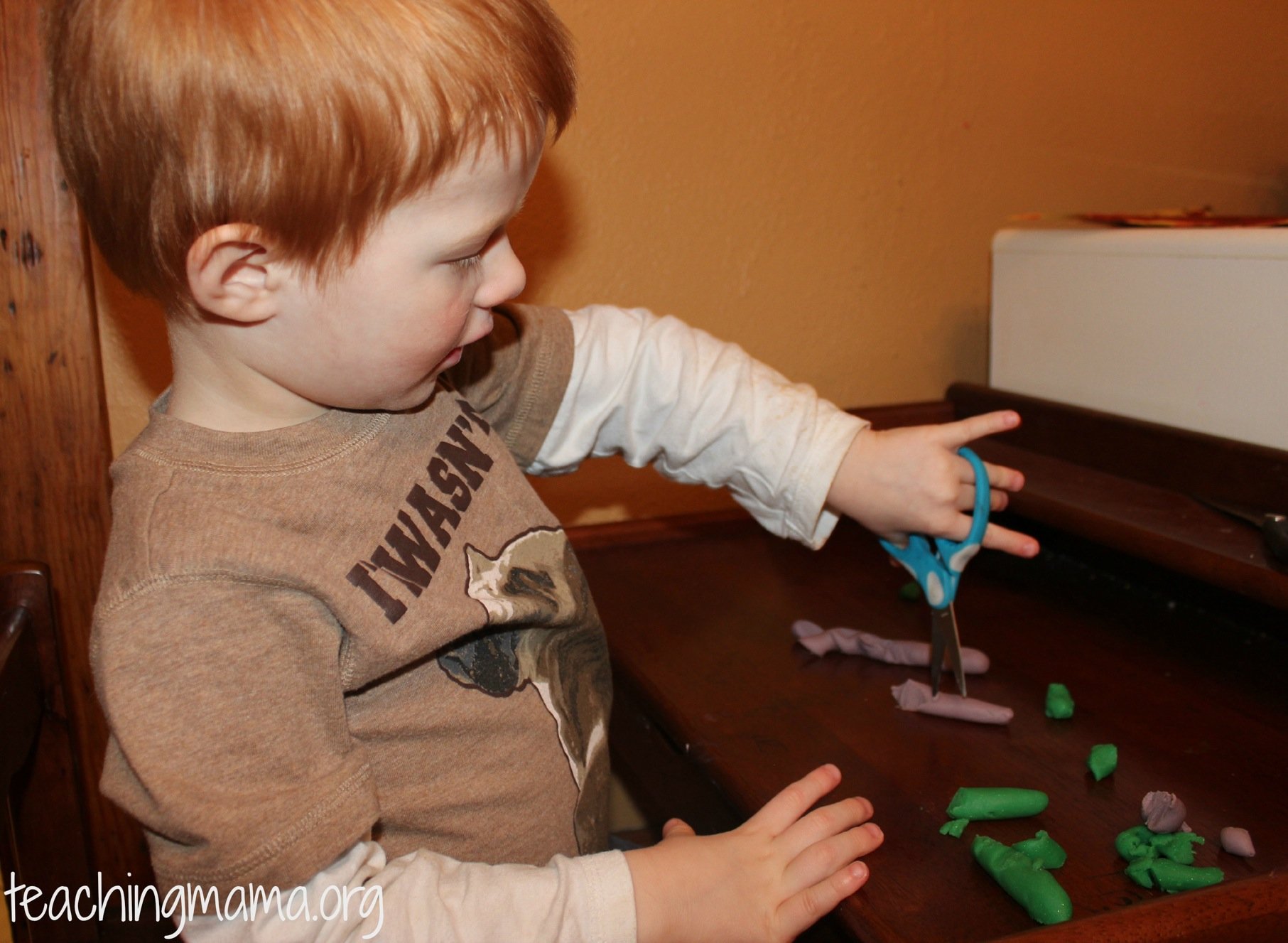 Teach Scissor Skills by Cutting Play-Doh - Teaching Littles