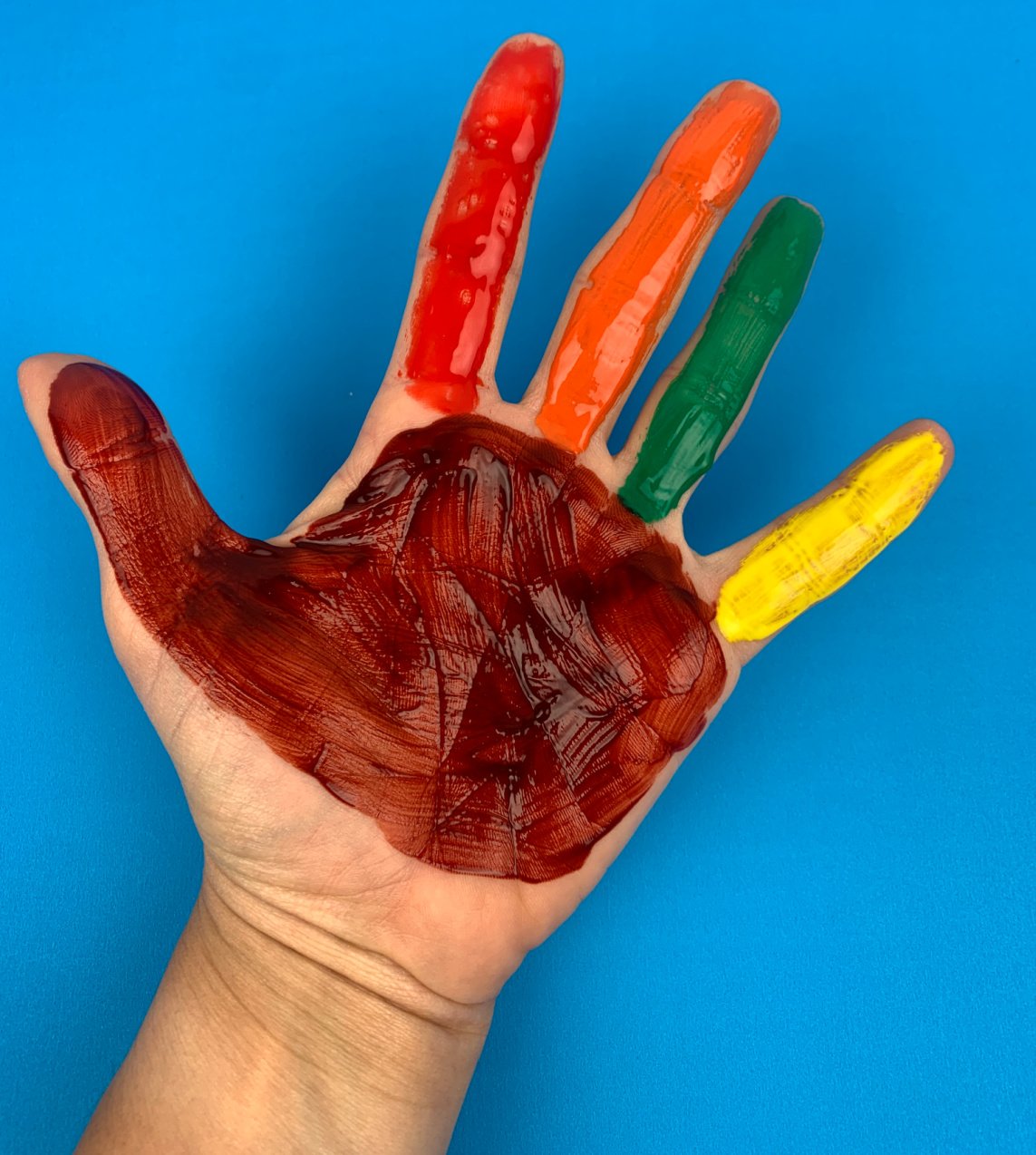 painted hand for handprint turkey