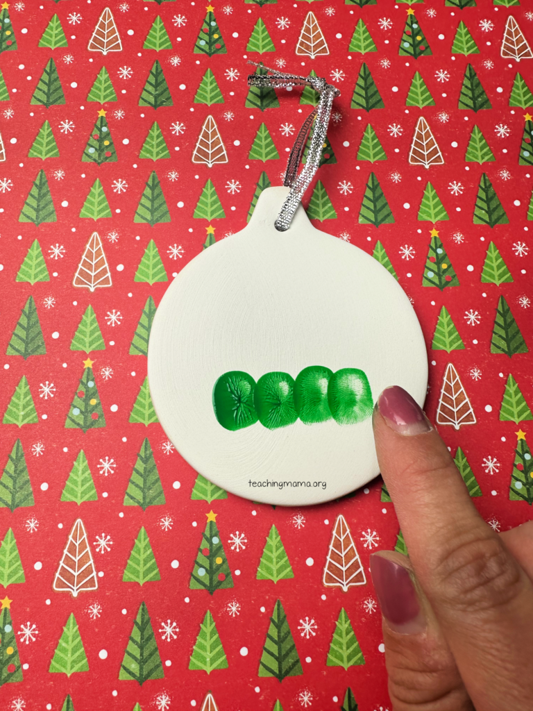 4 green fingerprints for the Christmas tree craft