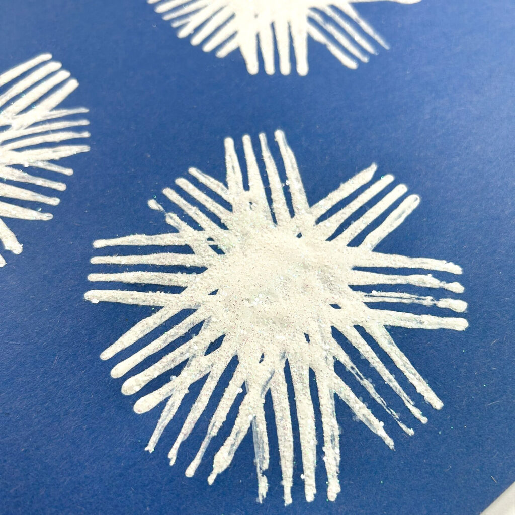 fork painted snowflake craft